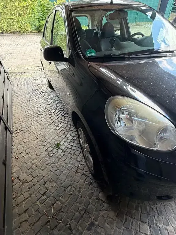 Gebraucht Nissan Micra Acenta 80 PS (58 kW) 2011 Schwarz Kleinwagen