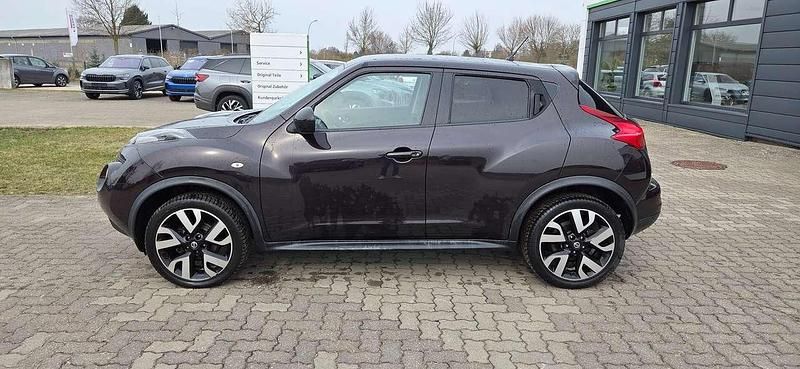 Gebraucht Nissan Juke Acenta 117 PS (86 kW) 2014 Violett/schwarz SUV