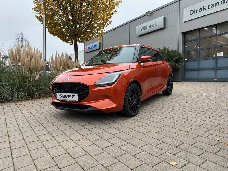 Orange Gebraucht 2024 Suzuki Swift Comfort+ Limousine | 19.390 € (Fairer Preis) - Bild 1/4