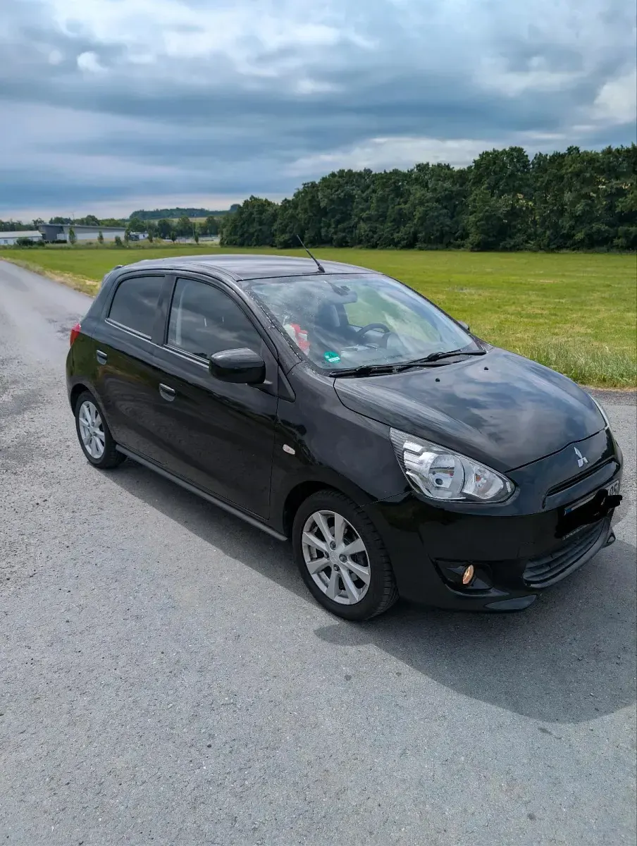 Gebraucht Mitsubishi Space Star 80 PS (58 kW) 2013 Schwarz Van / Kleinbus