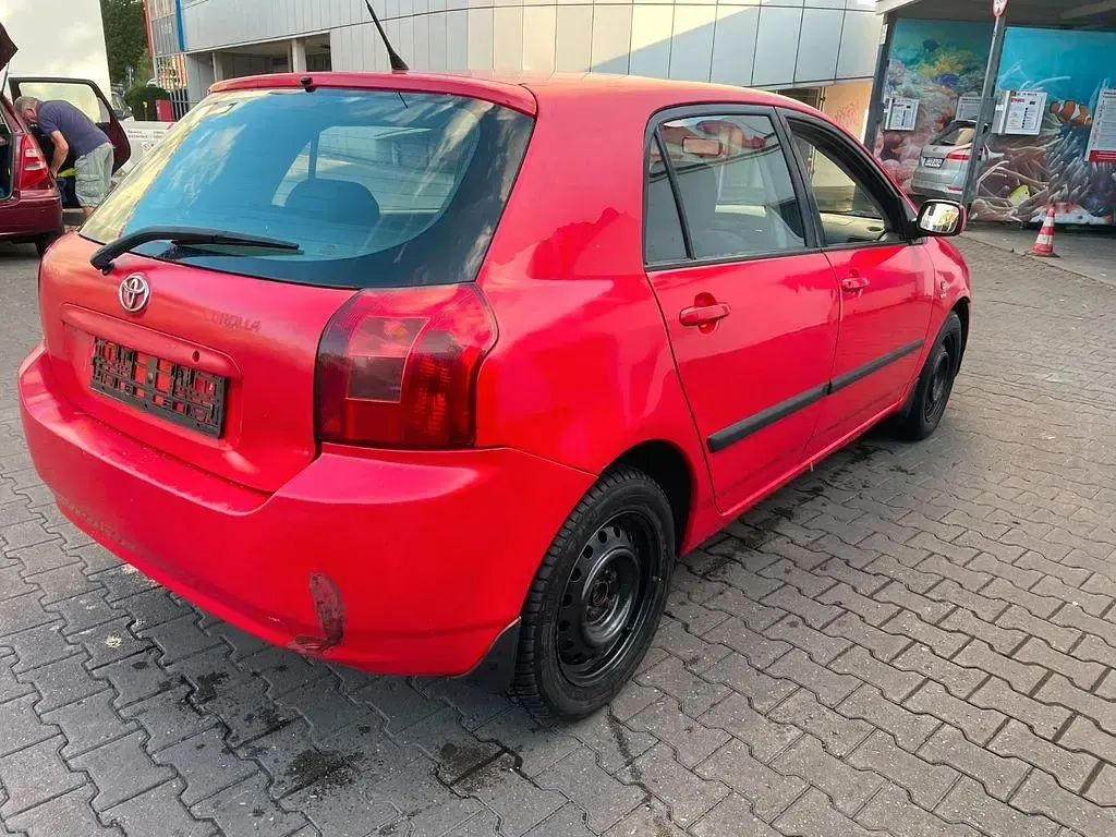 Gebraucht Toyota Corolla 97 PS (71 kW) 2004 Rot Kombi