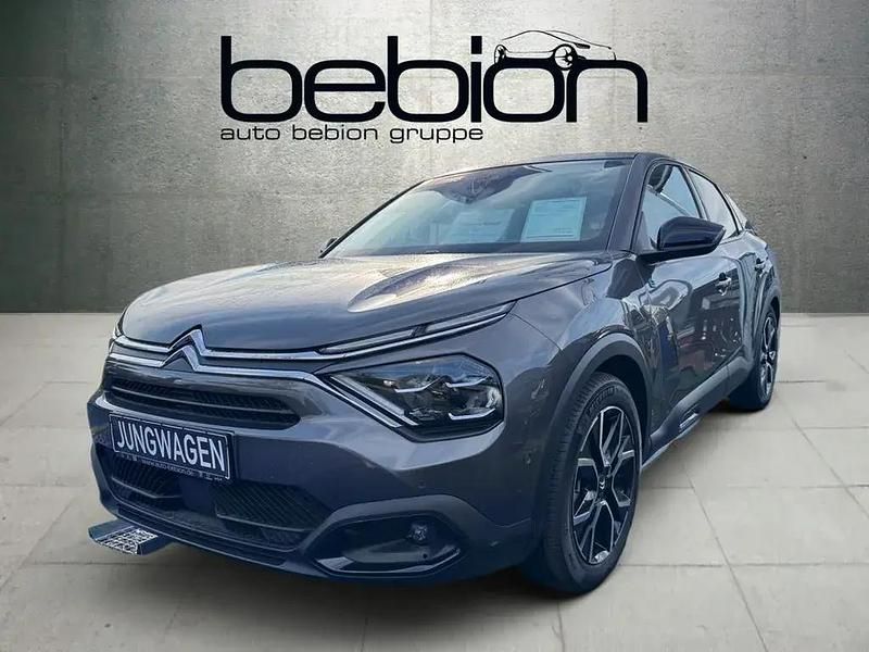 Grau Gebraucht 2023 Citroën e-C4 Shine Limousine | 21.900 € (Guter Preis) - Bild 1/4