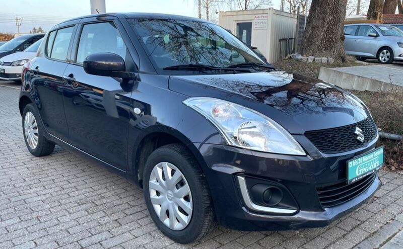 Grau Gebraucht 2014 Suzuki Swift Club Limousine | 7.750 € (Fairer Preis) - Bild 1/4