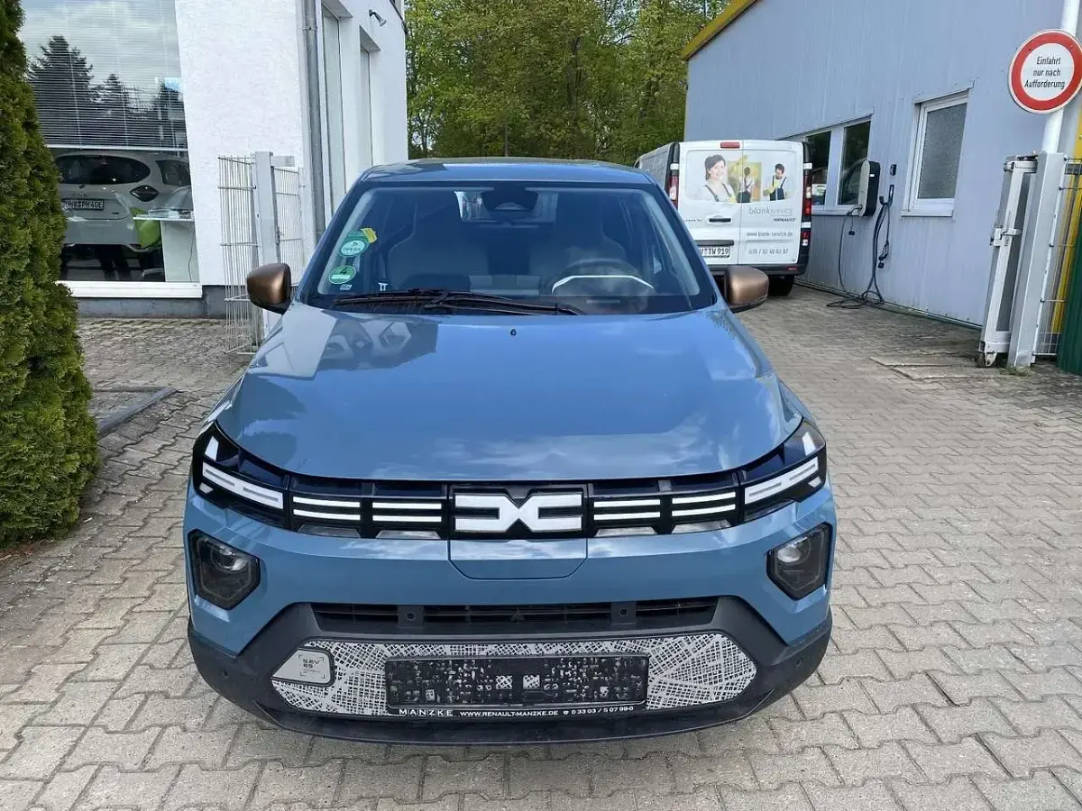 Gebraucht Dacia Spring Extreme 47 kW (65 PS) 2025 Schieferblau Kleinwagen