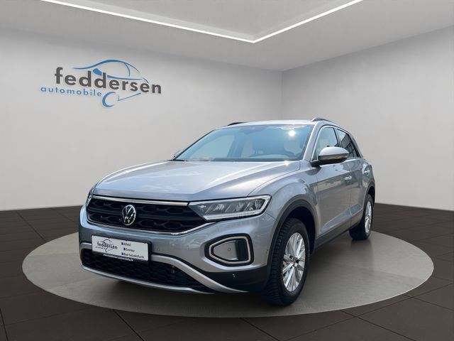 Pyrit silber metallic (metallic) Gebraucht 2024 VW T-Roc Life SUV | 27.428 € (Guter Preis) - Bild 1/4