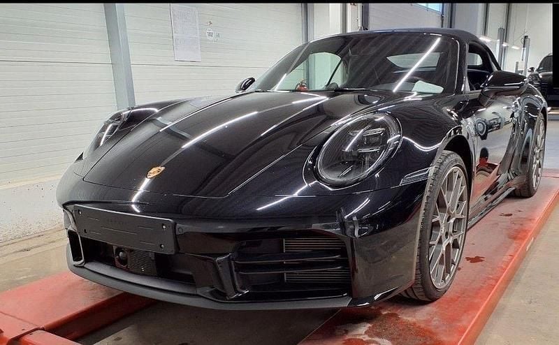 Tiefschwarzmetallic Gebraucht 2025 Porsche 911 Carrera Cabriolet Cabrio | 142.790 € - Bild 1/4
