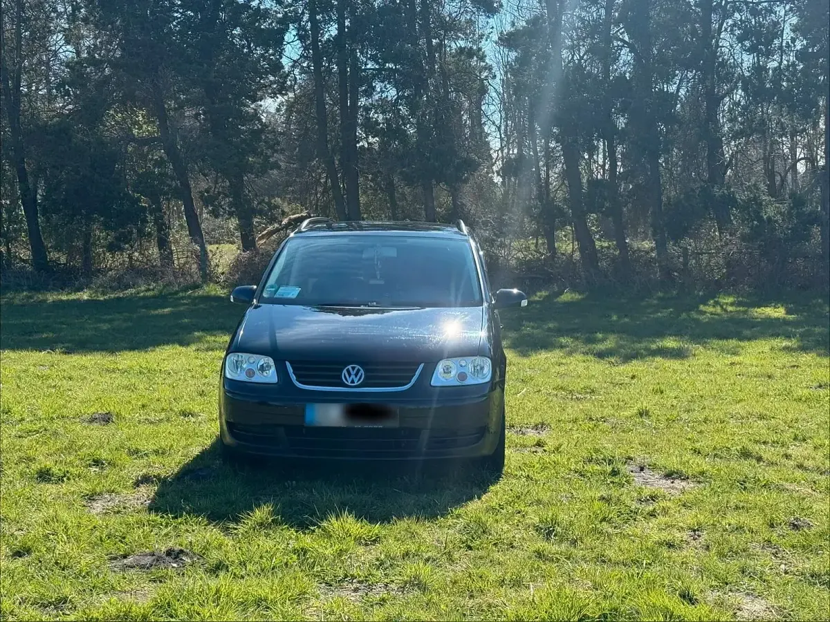 Używany VW Touran 120 KM (88 kW) 2006 Czarny Minivan