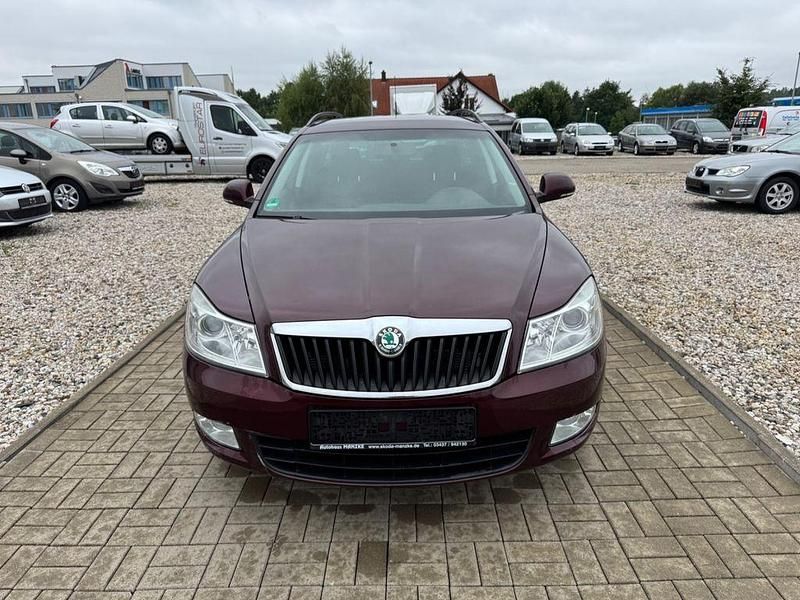 Second-hand Skoda Octavia Impuls Edition 105 CP (77 kW) 2011 Roșu Break