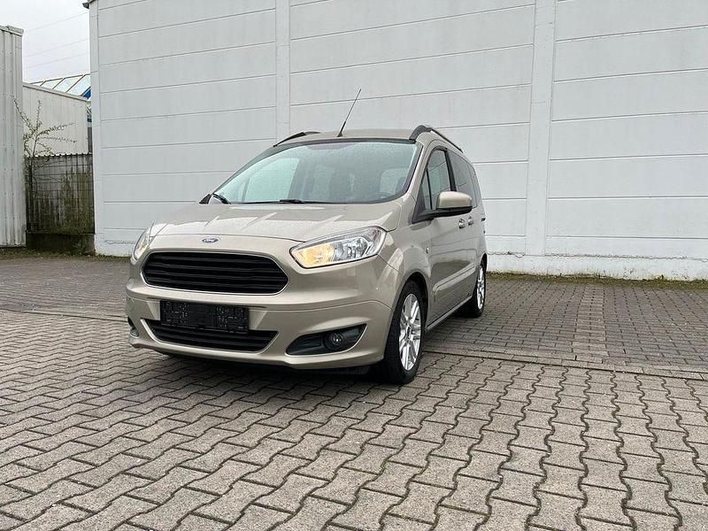 Silber Gebraucht 2015 Ford Tourneo Courier Titanium Van / Kleinbus | 7.890 € (Superpreis) - Bild 1/4