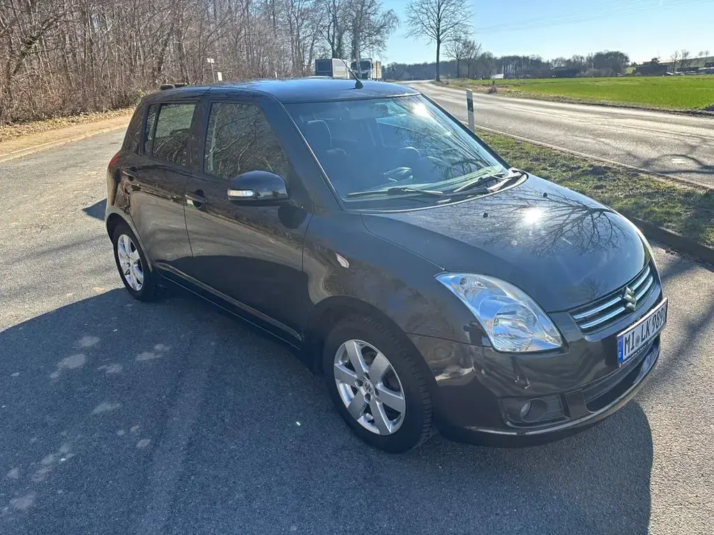 Gebraucht Suzuki Swift Club 92 PS (67 kW) 2009 Schwarz Kleinwagen