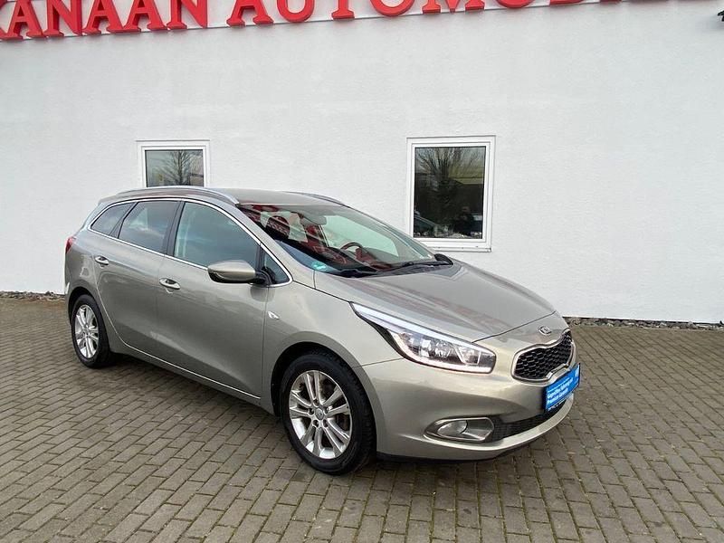 Grau Gebraucht 2014 Kia Ceed Sportswagon DREAM-TEAM Edition Kombi | 6.990 € (Guter Preis) - Bild 1/4