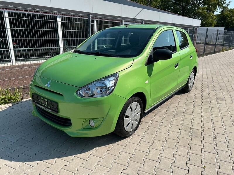 Grün Gebraucht 2013 Mitsubishi Space Star Kleinwagen | 3.990 € (Fairer Preis) - Bild 1/4