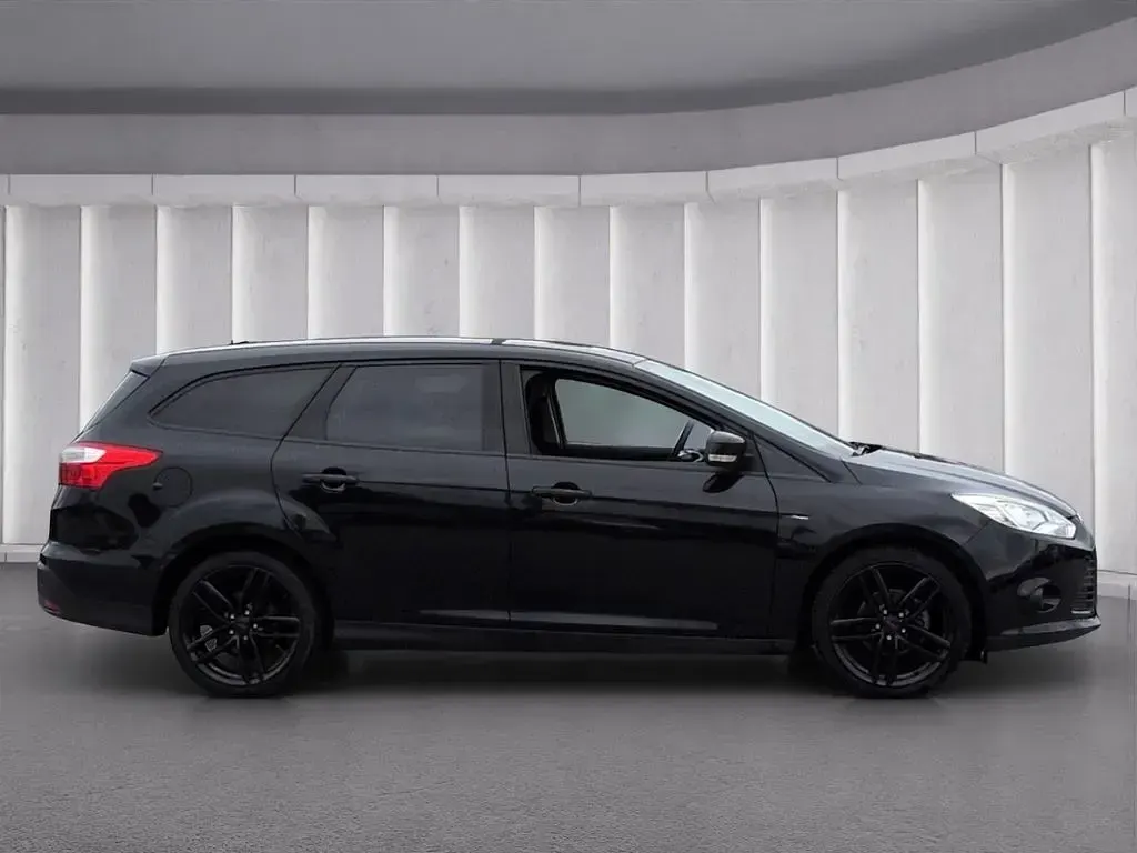 Gebraucht Ford Focus 125 PS (91 kW) 2014 Schwarz metallic Kombi