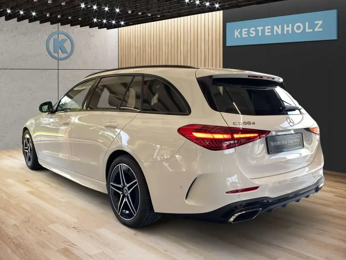 Gebraucht Mercedes C200 AMG 163 PS (119 kW) 2024 Unilack polarweiß Kombi