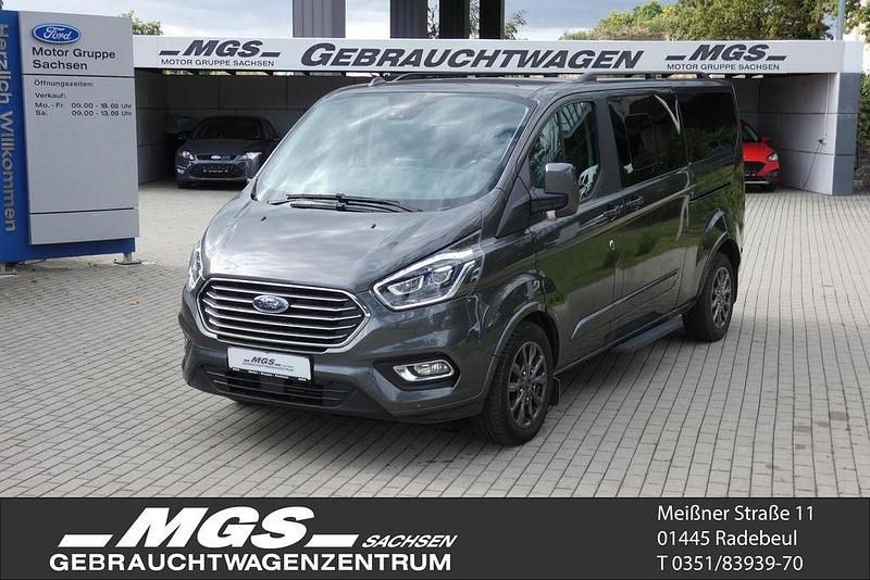Magneticgrau (metallic) Gebraucht 2021 Ford Tourneo Custom Titanium X Van / Kleinbus | 37.950 € (Fairer Preis) - Bild 1/4