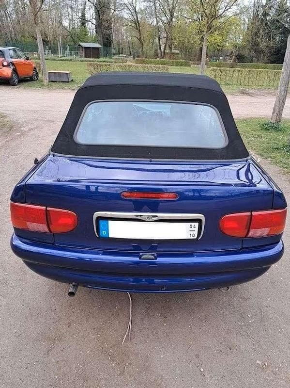 Gebraucht Ford Escort Cabriolet Ghia 90 PS (66 kW) 1997 Blau Cabrio
