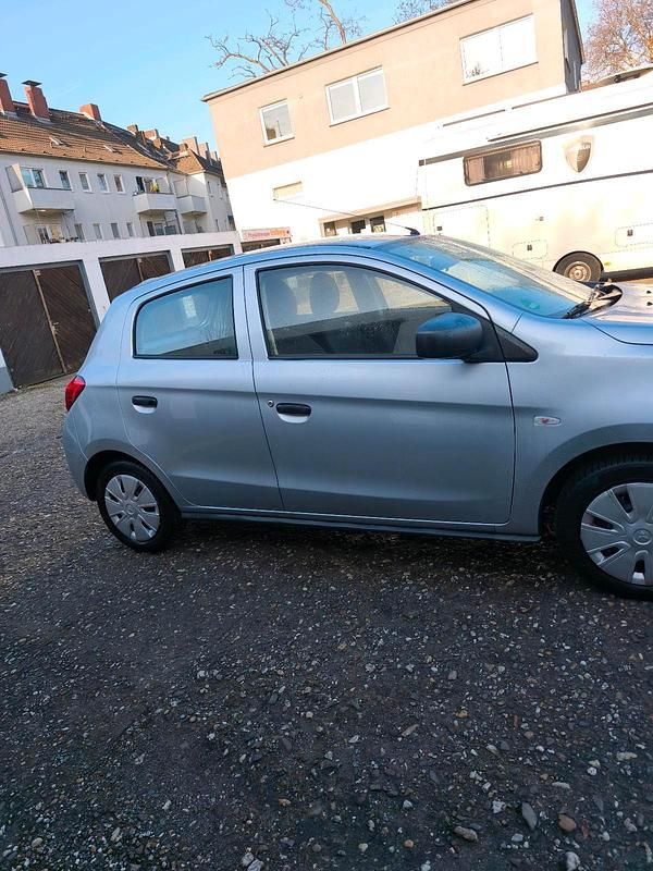 Gebraucht Mitsubishi Space Star 71 PS (52 kW) 2013 Silber Kleinwagen