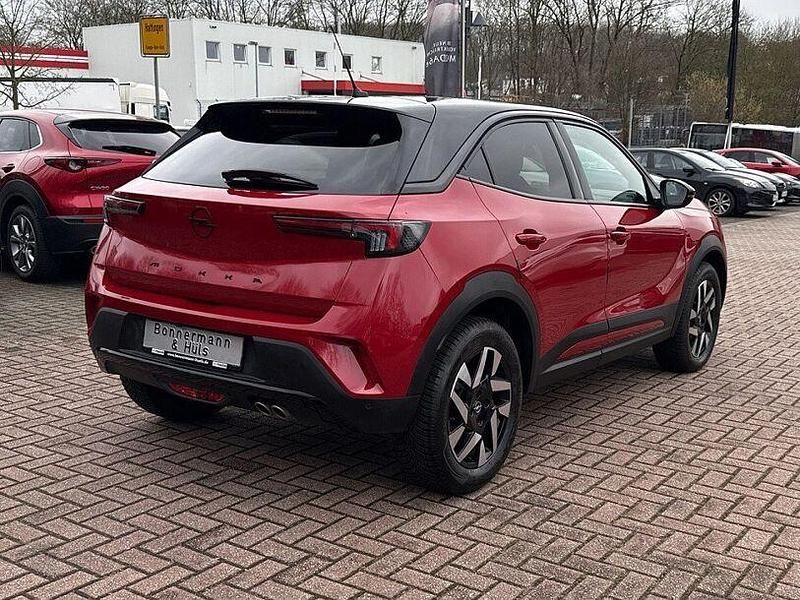 Gebraucht Opel Mokka 131 PS (96 kW) 2024 Lackierung rot rubi/typ aussen SUV