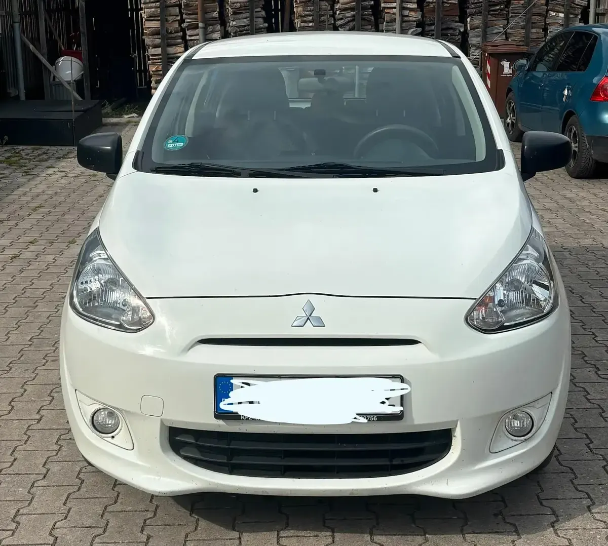 Gebraucht Mitsubishi Space Star 75 PS (55 kW) 2015 Weiß Kleinwagen
