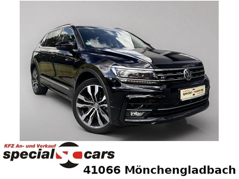 Deep black (metallic) Gebraucht 2019 VW Tiguan Allspace R-line SUV | 33.990 € (Teuer) - Bild 1/4