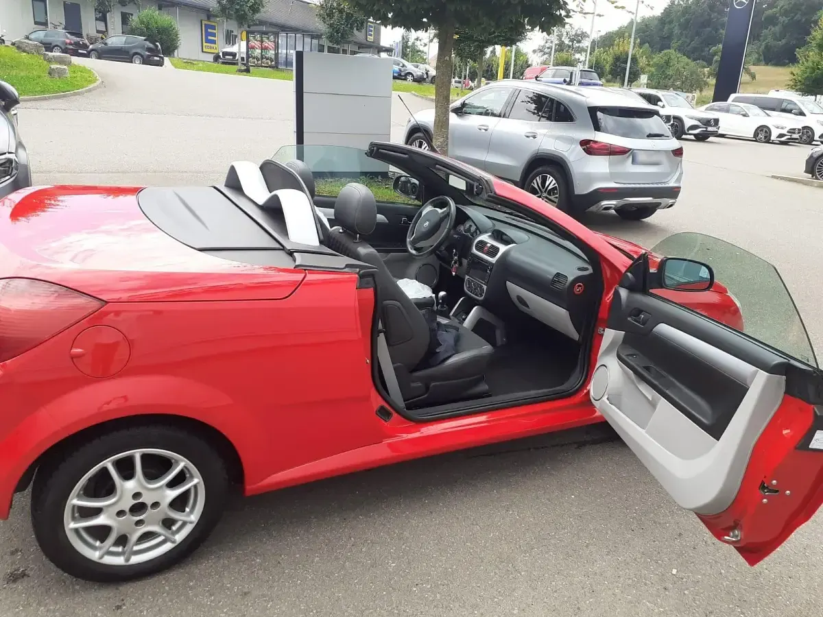 Gebraucht Opel Tigra 90 PS (66 kW) 2009 Rot Cabrio