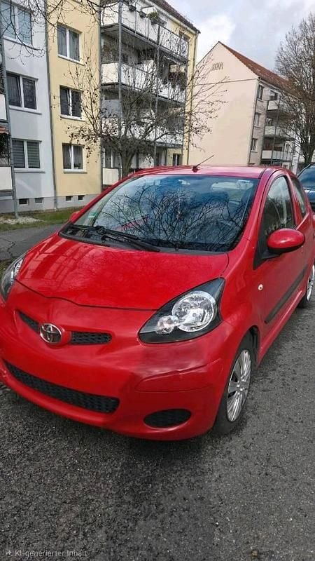 Gebraucht Toyota Aygo 68 PS (50 kW) 2009 Rot Kleinwagen