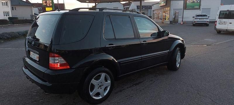 Schwarz Gebraucht 2002 Mercedes ML55 AMG AMG SUV | 7.500 € - Bild 1/4
