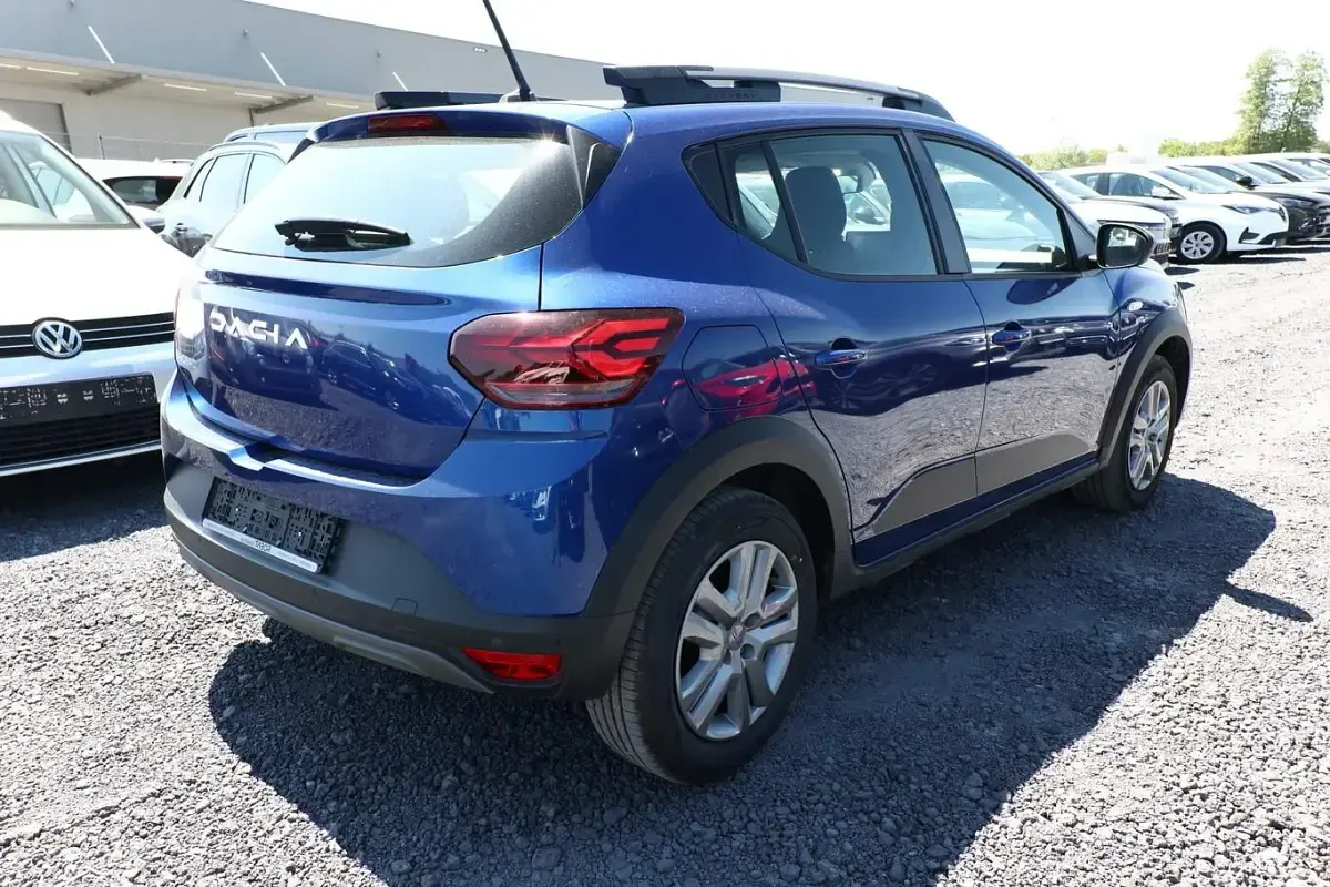 Gebraucht Dacia Sandero Expression 91 PS (66 kW) 2023 Iron blau metallic SUV