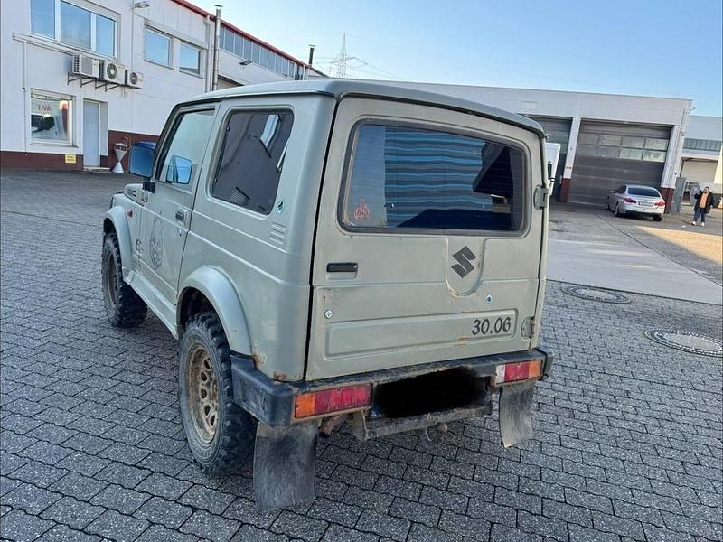 Second-hand Suzuki Samurai 69 CP (50 kW) 1998 Verde SUV
