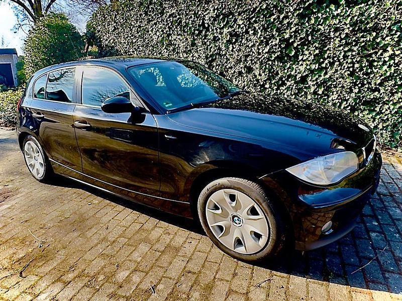 Second-hand BMW 116 Performance 122 CP (89 kW) 2006 Negru Hatchback