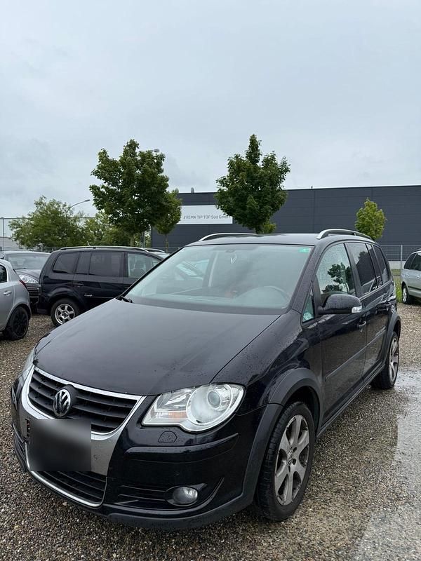 Schwarz Gebraucht 2009 VW Touran Cross Van / Kleinbus | 4.200 € - Bild 1/4
