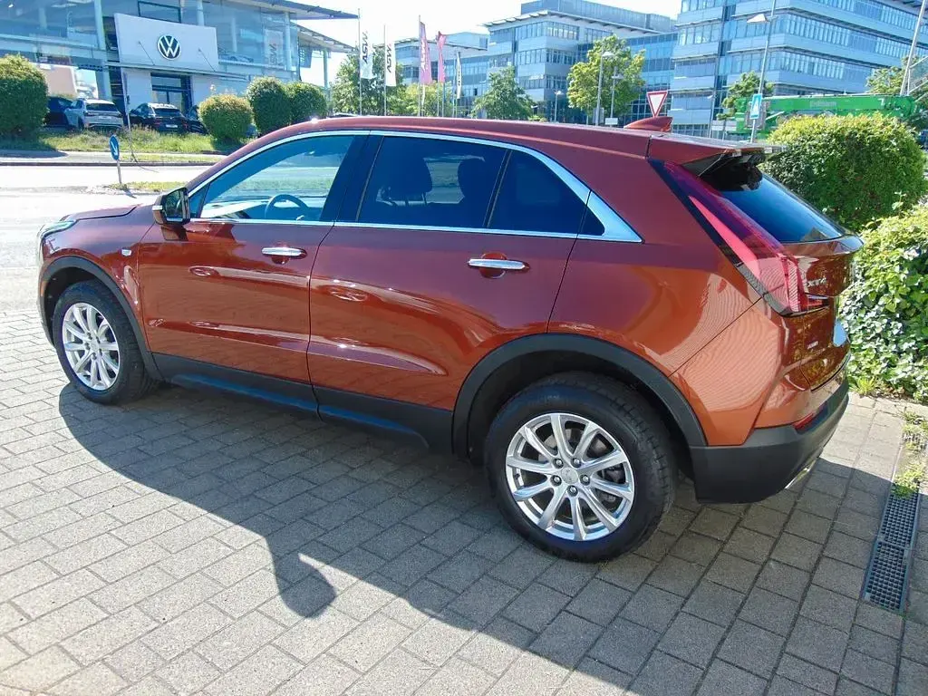 Gebraucht Cadillac XT4 230 PS (169 kW) 2022 Autumn orange metallic SUV