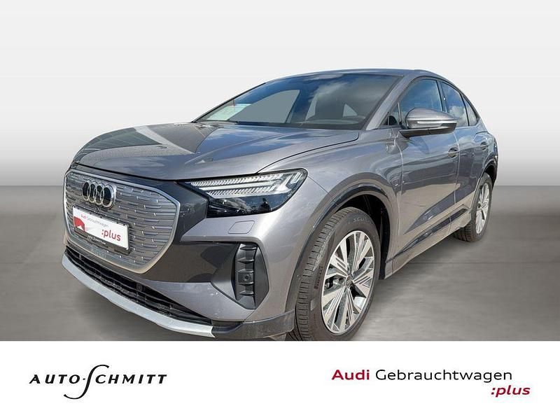 Taifungrau metallic Gebraucht 2023 Audi Q4 Sportback e-tron Ambiente SUV | 42.880 € (Etwas zu teuer) - Bild 1/4