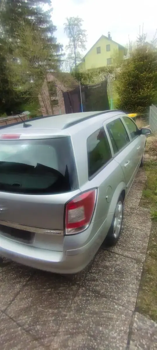 Używany Opel Astra 125 KM (91 kW) 2008 Srebrny Kombi