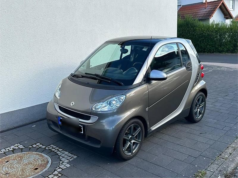Grau Gebraucht 2010 Smart ForTwo Coupé Passion Kleinwagen | 4.499 € (Fairer Preis) - Bild 1/4