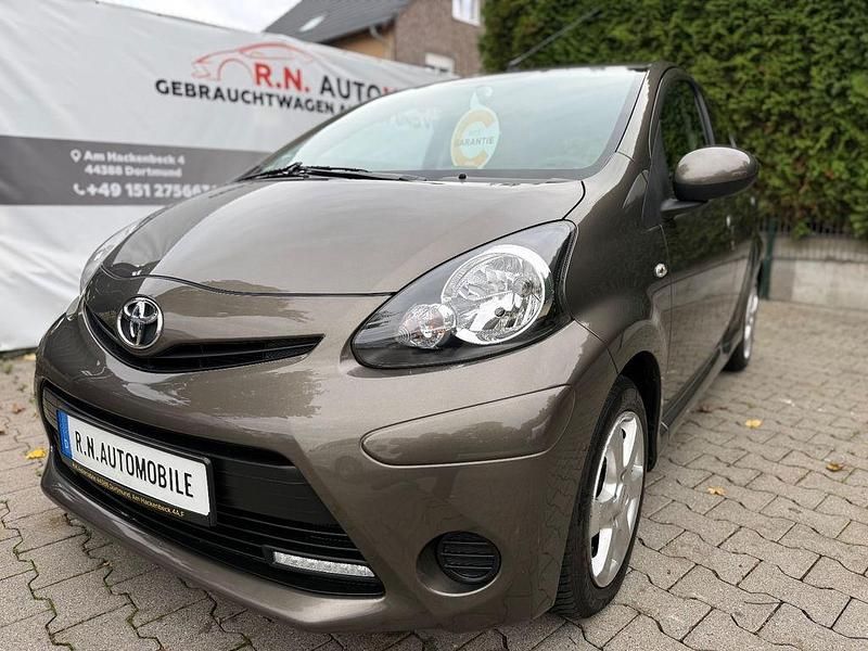 Gebraucht Toyota Aygo Cool 68 PS (50 kW) 2013 Braun Kleinwagen