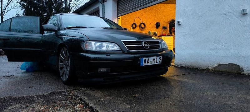 Second-hand Opel Omega 211 CP (155 kW) 2000 Negru Berlinǎ