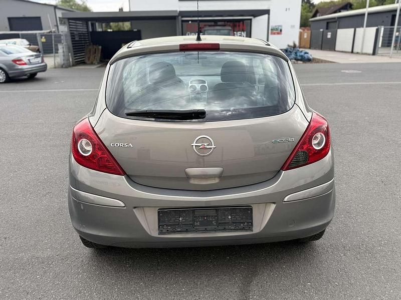 Gebraucht Opel Corsa Basis 60 PS (44 kW) 2011 Magma rot (b) Kleinwagen