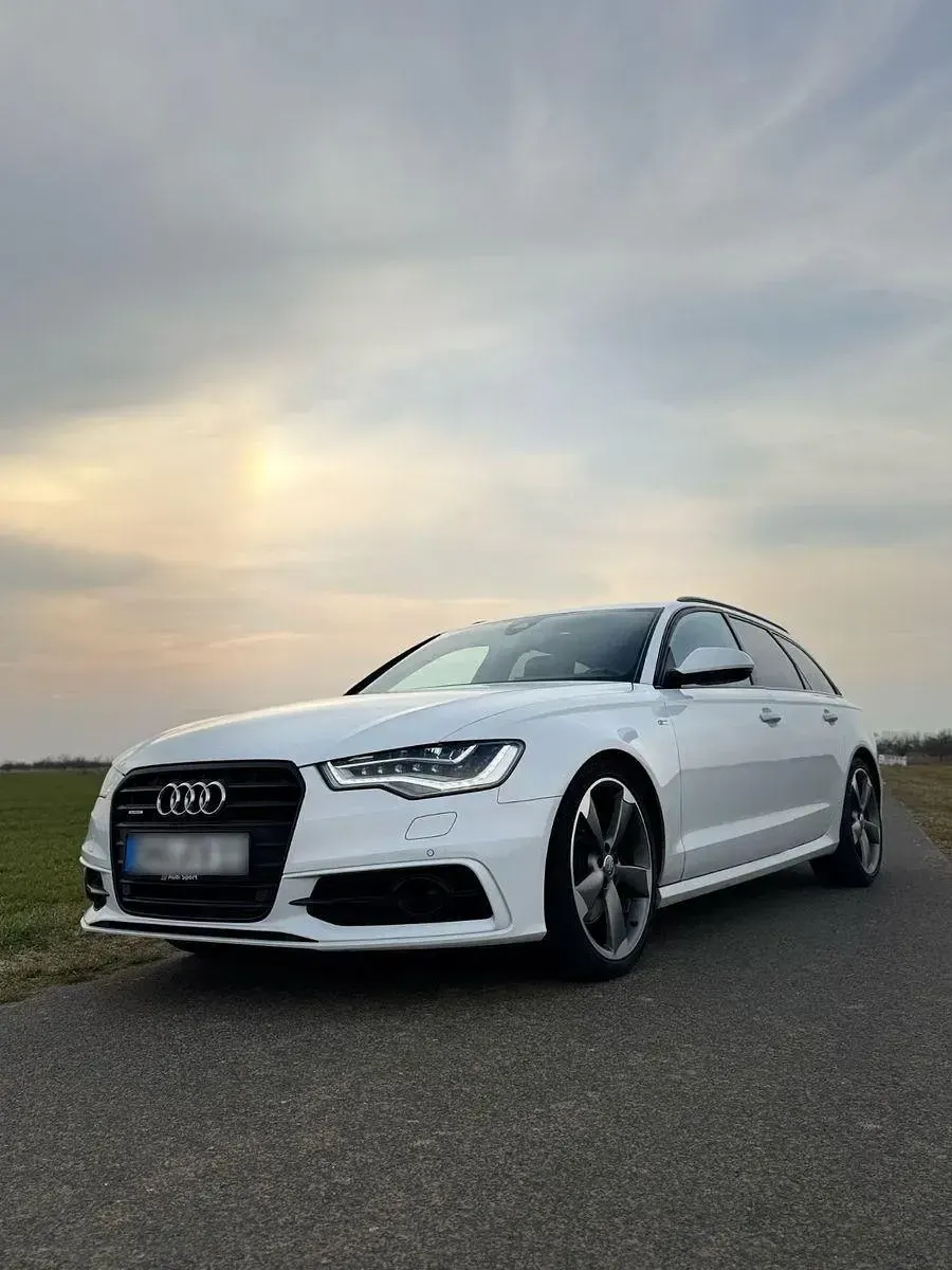 Używany Audi A6 Ambiente 245 KM (180 kW) 2014 Biały Kombi