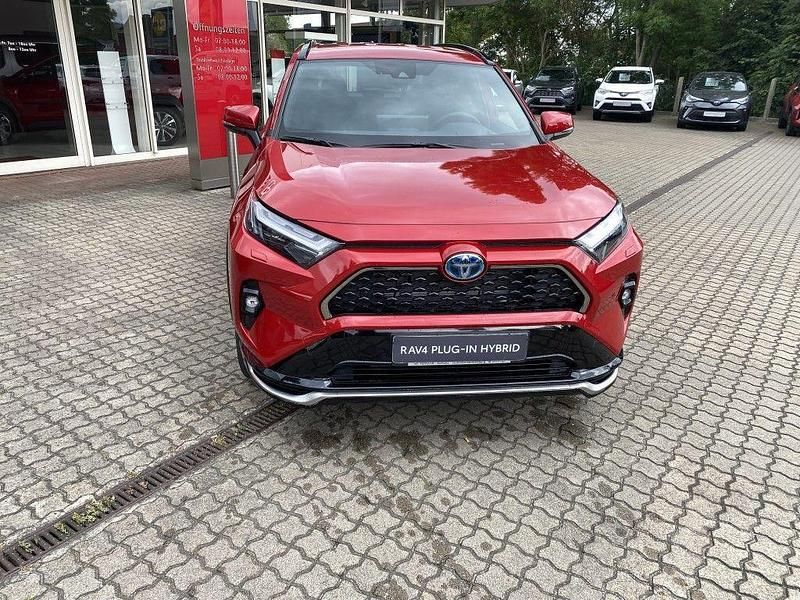 Gebraucht Toyota RAV4 Hybrid 306 PS (225 kW) 2025 Karminarot metallic SUV