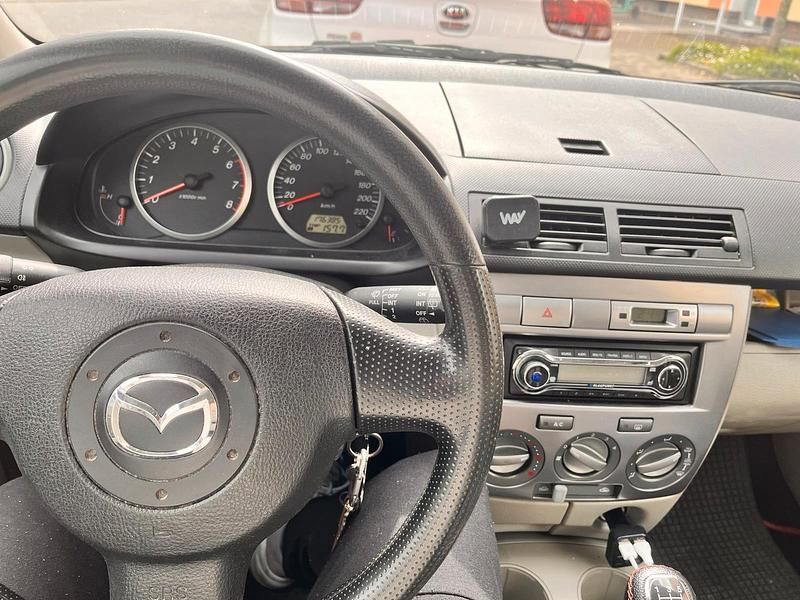 Second-hand Mazda 2 75 CP (55 kW) 2006 Roșu Hatchback