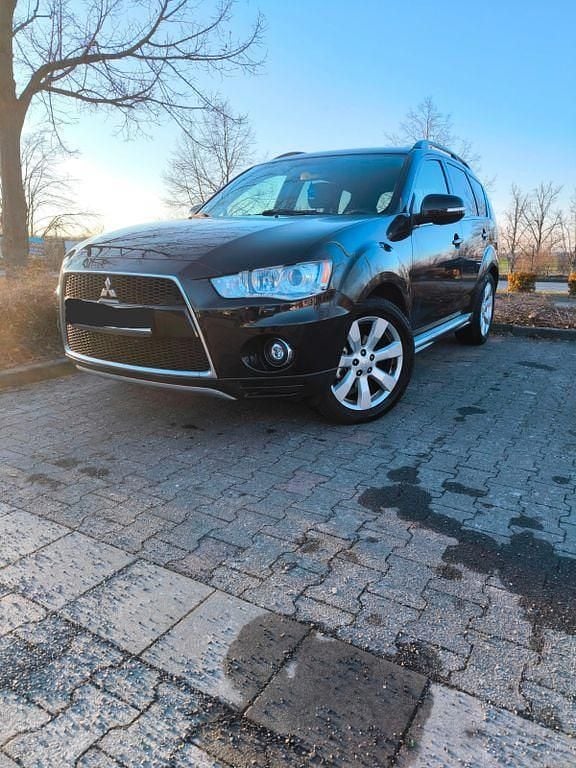 Schwarz Gebraucht 2011 Mitsubishi Outlander SUV | 6.600 € (Fairer Preis) - Bild 1/4