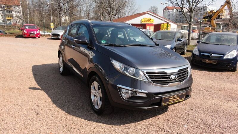 Grau Gebraucht 2012 Kia Sportage Vision SUV | 9.980 € (Fairer Preis) - Bild 1/4