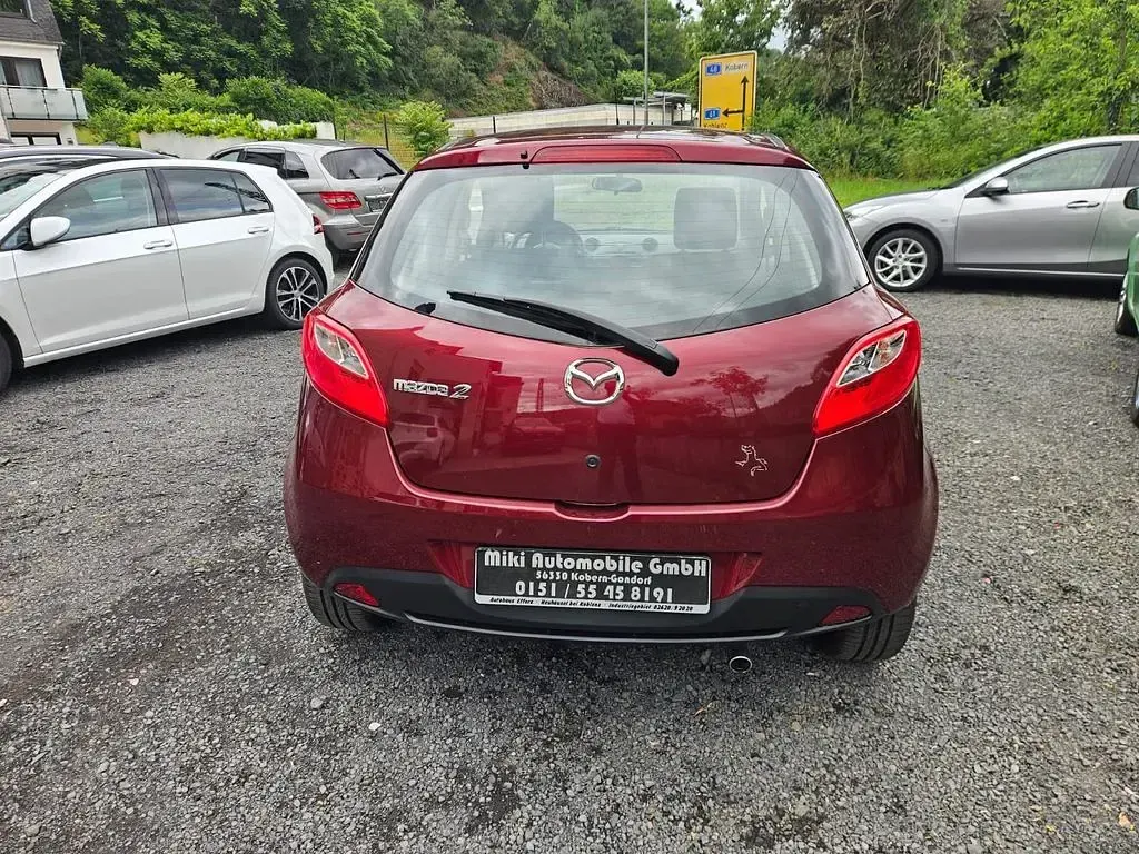 Gebraucht Mazda 2 Active 75 PS (55 kW) 2011 Rot Kleinwagen