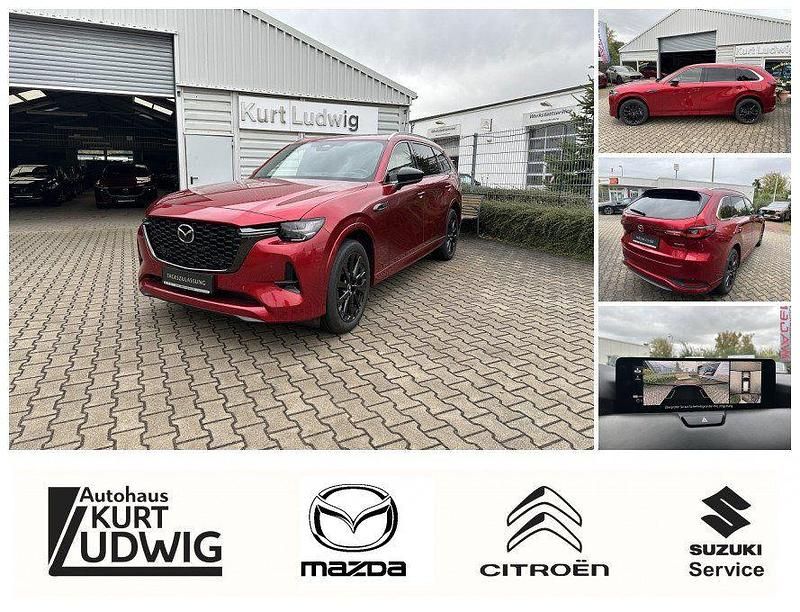 Soul red crystal m Gebraucht 2024 Mazda CX-80 Homura-Line SUV | 58.990 € (Fairer Preis) - Bild 1/4