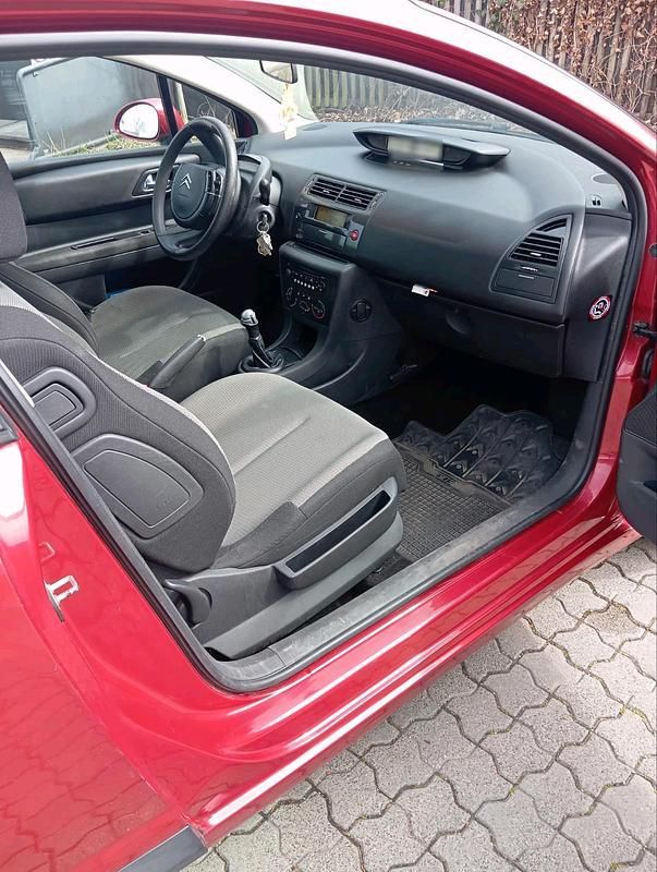 Second-hand Citroën C4 105 CP (77 kW) 2006 Roșu Hatchback