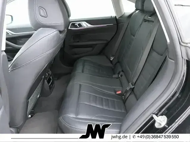 Gebraucht BMW i4 Sport Line 250 kW (340 PS) 2023 Black sapphire metallic Limousine