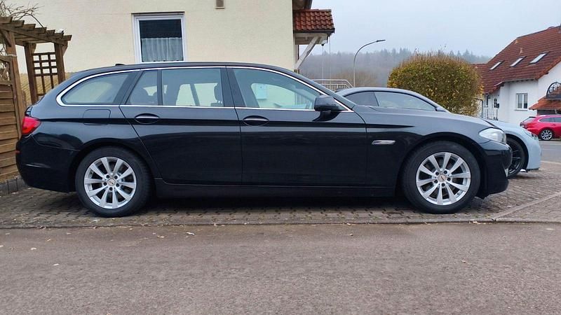 Gebraucht BMW 520 184 PS (135 kW) 2011 Schwarz Kombi