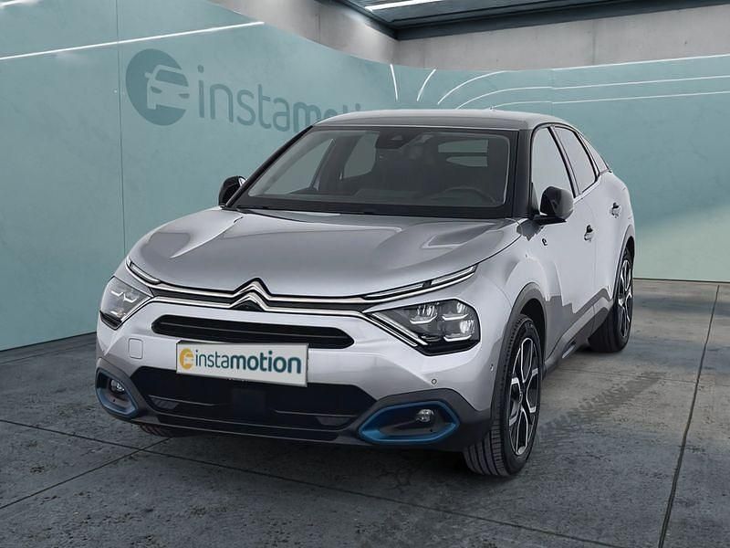 Grau Gebraucht 2022 Citroën e-C4 Shine Limousine | 20.699 € (Fairer Preis) - Bild 1/4