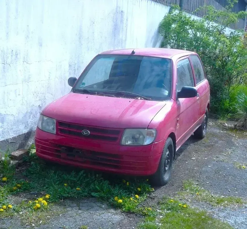 Gebraucht Daihatsu Cuore 56 PS (41 kW) 1998 Rot Kleinwagen